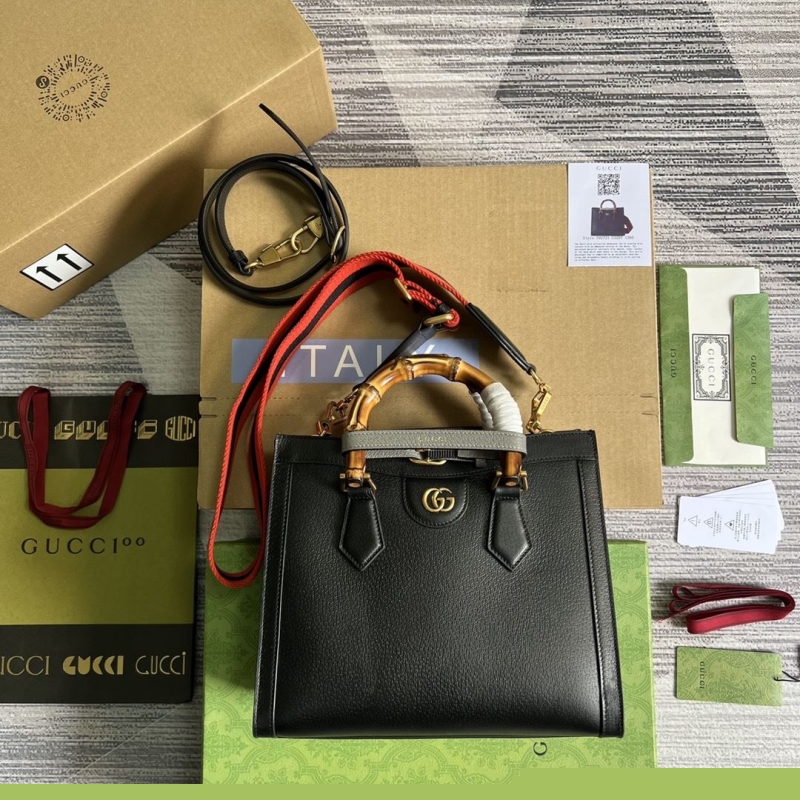 G*u*i top handle bags